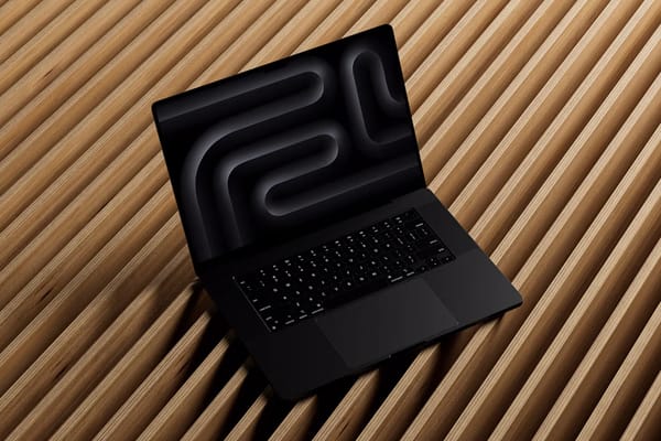 MacBook Pro Mockup on Wood Fence
