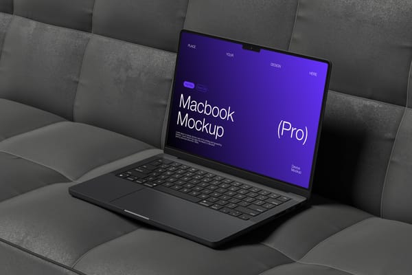 Macbook Mockup On Black Sofa