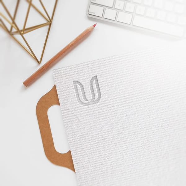 Embossed Logo Mockup With Office Desk