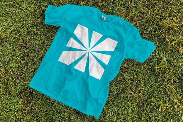 T-Shirt Mockup Lay on Grass